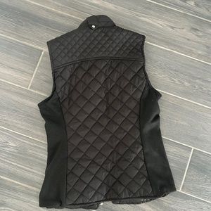 Woman’s puffy vest